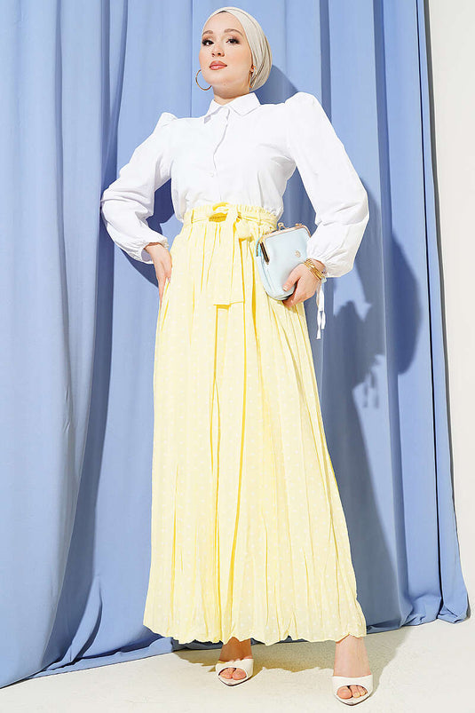 Jupe plissée à pois avec ceinture beige