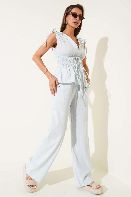 Two-piece set with blouse and elasticated waist detail, ice blue.