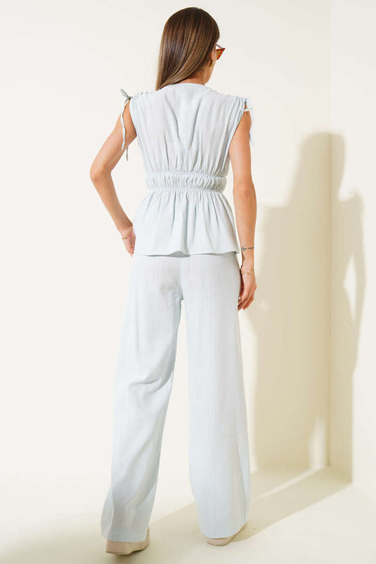 Two-piece set with blouse and elasticated waist detail, ice blue.