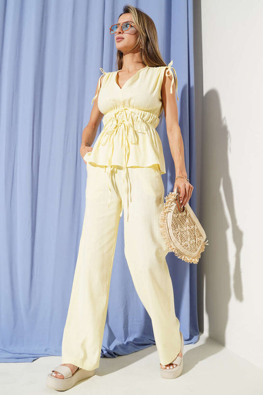 Two-piece set with blouse and elasticated waist detail, yellow.