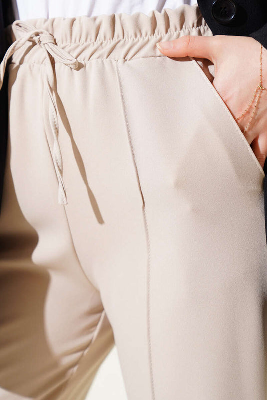 Bel Lastikli Çımalı Bol Paça Pantolon Bej