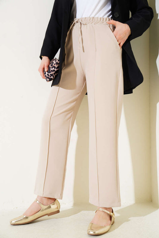 Pantalon large à taille élastique beige