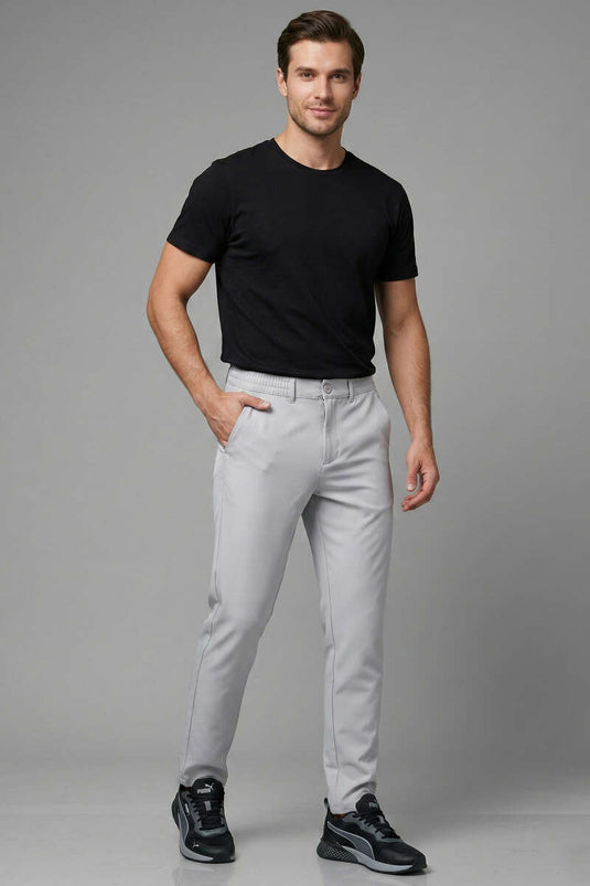 Pantalon homme gris slim à bas resserré avec ceinture élastique
