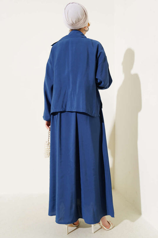 فستان سهرة بتفاصيل أزرار مطاطية على الخصر باللون الأزرق الداكن