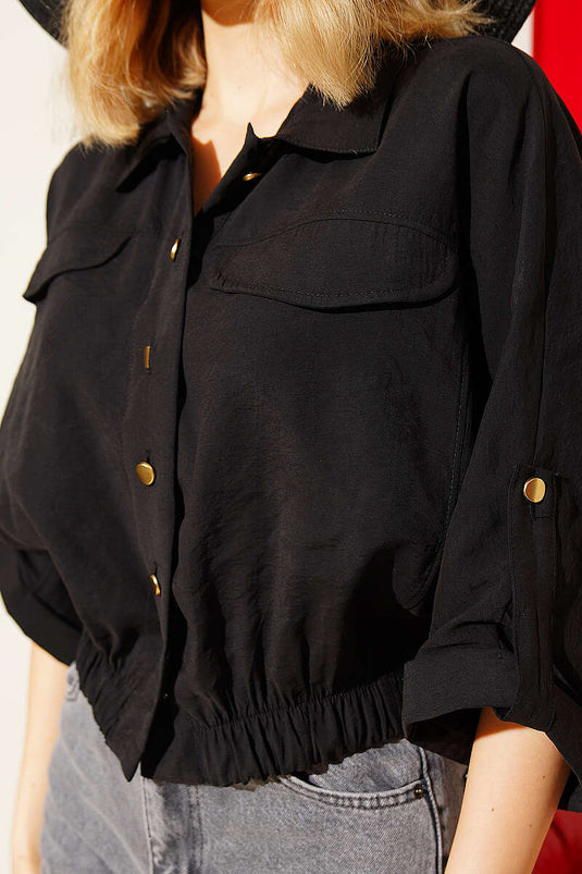 Chemise courte à manches raglan élastiquées noire