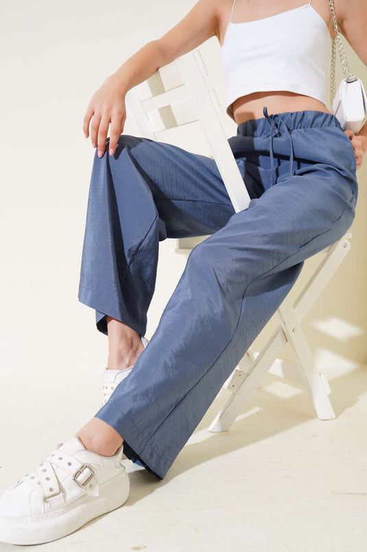 Pantalon brillant indigo à taille élastique et jambes larges