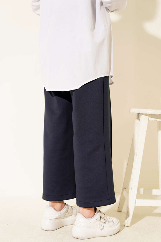 Pantalon de plongée à jambes larges avec taille élastique, bleu marine.