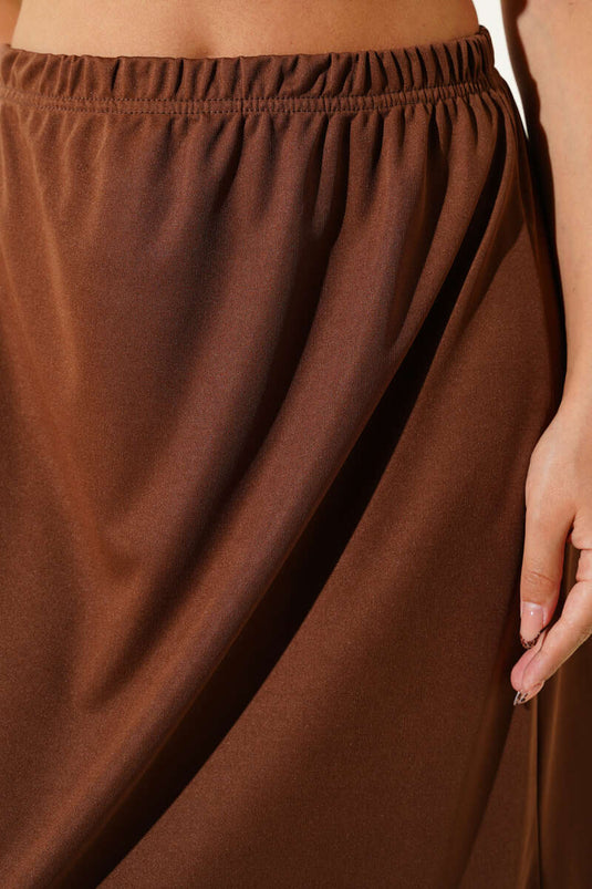 تنورة داخلية بنية اللون بحزام خصر مطاطي