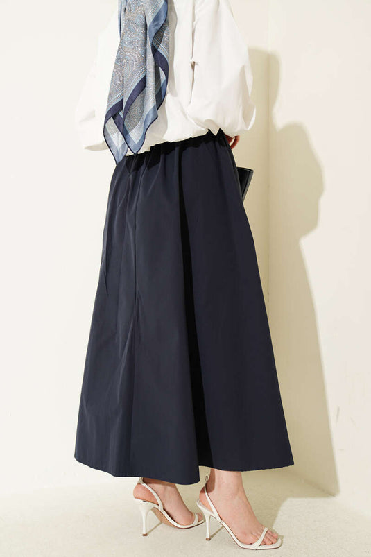 Jupe en popeline bleu marine avec ceinture élastique à la taille
