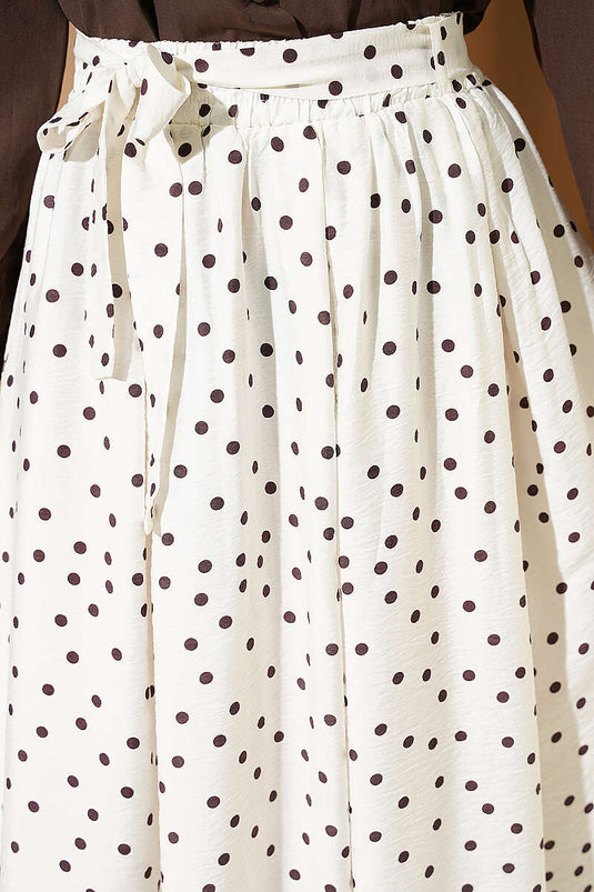 Jupe à pois écrue avec ceinture élastique