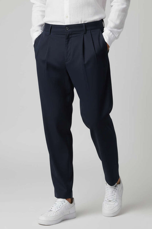 Pantalon homme bleu marine à taille élastique et plis sur le devant