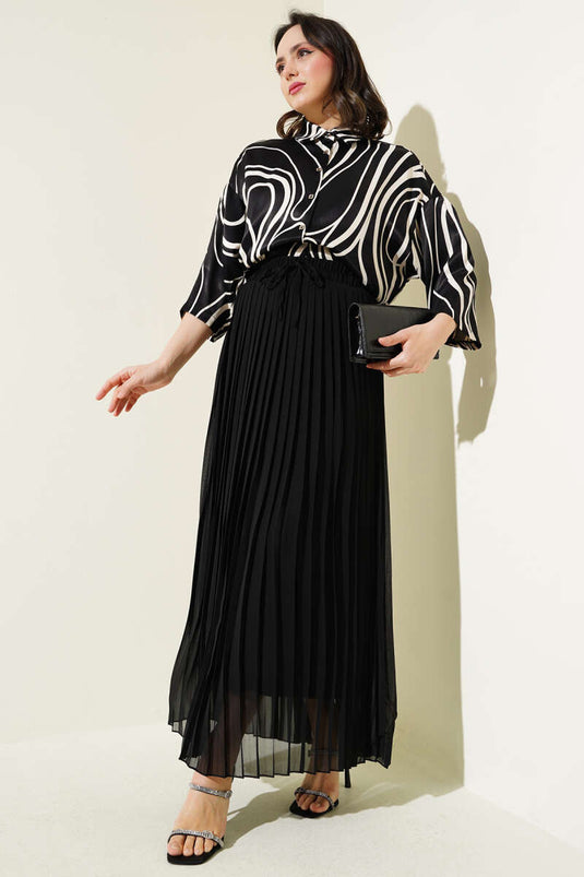 تنورة شيفون مطوية بخصر مطاطي باللون الأسود