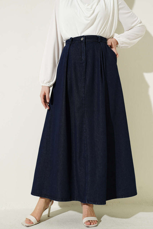 Gonna di jeans blu scuro con tasche e pieghe