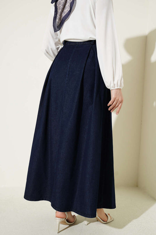 Gonna di jeans blu scuro con tasche e pieghe