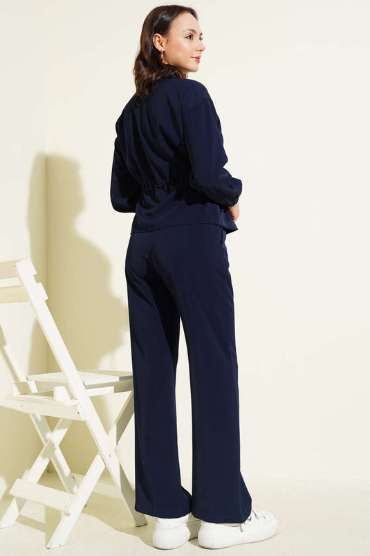 Set base doppio con zip e collo a V blu scuro