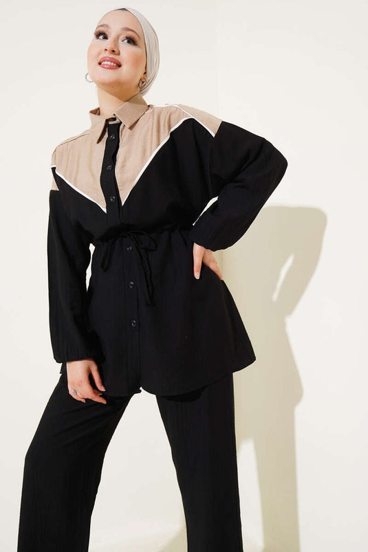 طقم من قطعتين مع نفق للخصر وحافة على شكل حرف V، أسود