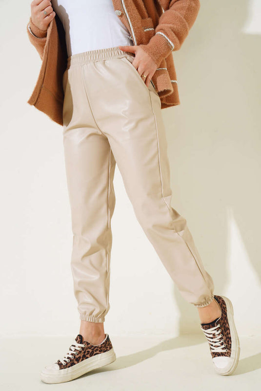 Pantalon en cuir élastique à la taille et aux jambes Beige