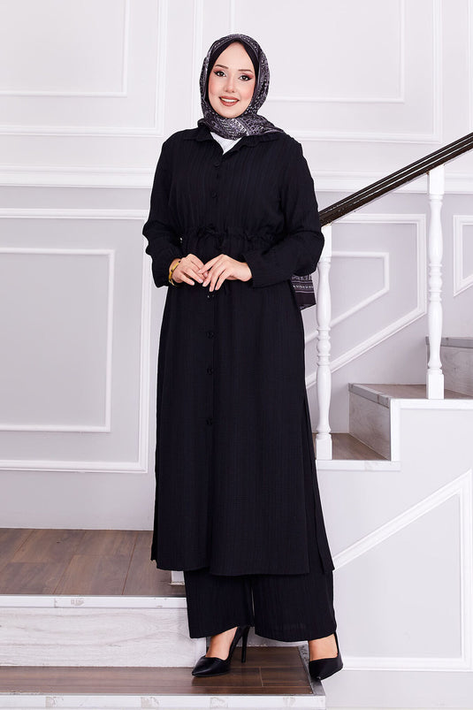 بدلة حجاب سوداء مع بنطلون مربوط عند الخصر