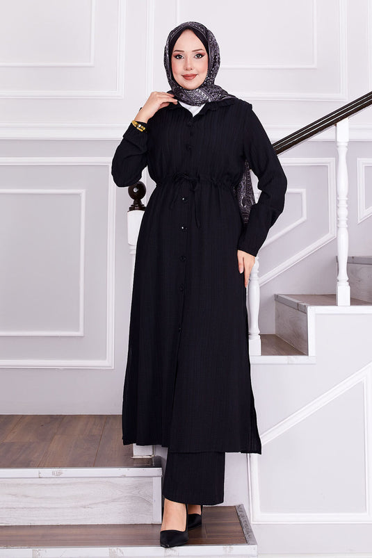 بدلة حجاب سوداء مع بنطلون مربوط عند الخصر