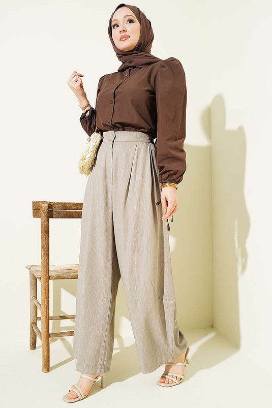 Pantalon sarouel plissé à boutons beige
