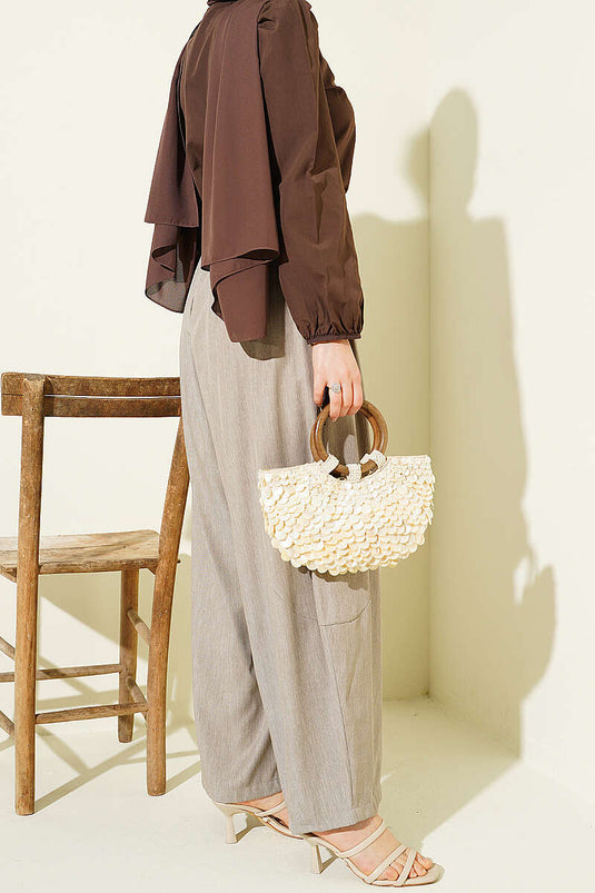 Pantalon sarouel plissé à boutons beige