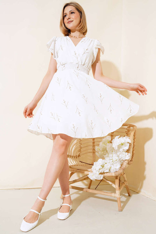 Robe fleurie cintrée couleur écru