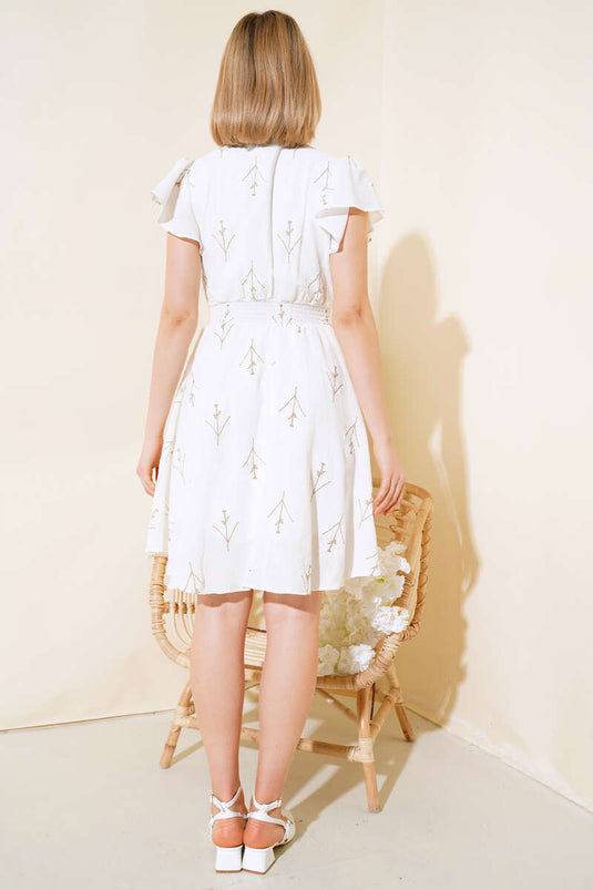 Robe fleurie cintrée couleur écru