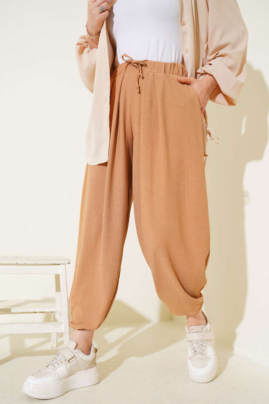 Pantalon ample avec cordon noué à la taille, couleur camel