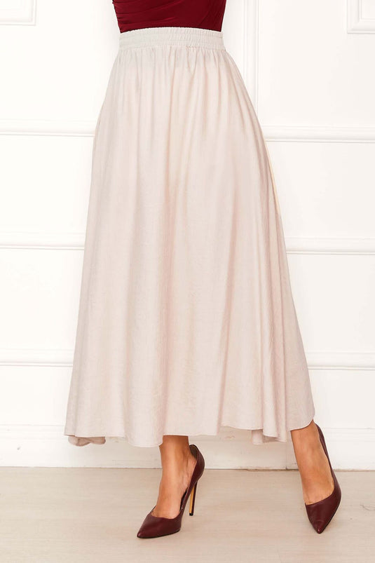 Gonna con tasche elastiche beige