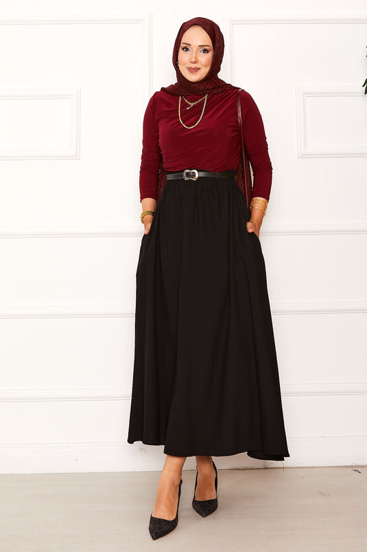 Jupe noire avec ceinture élastique et détails de poche