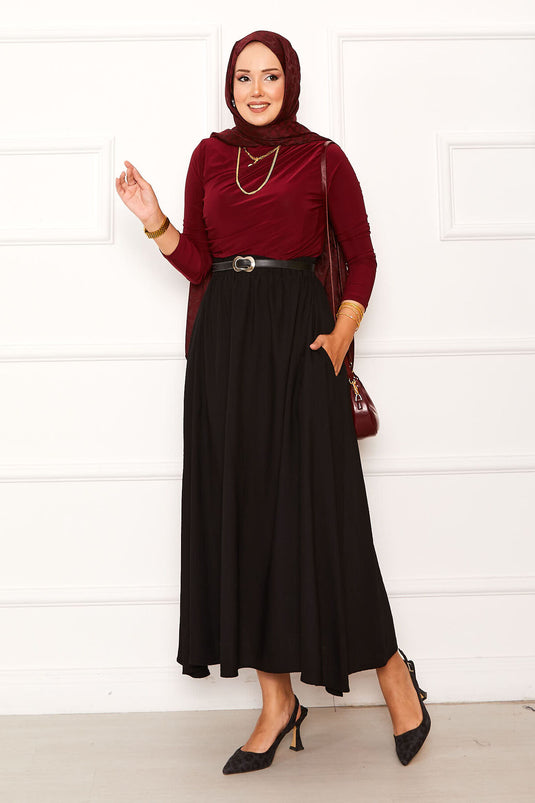 Jupe noire avec ceinture élastique et détails de poche