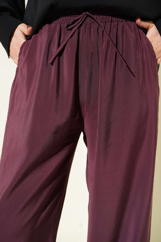 Pantalon en modal bordeaux avec poches et taille élastique