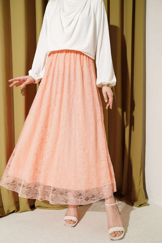 Gonna elastica con pizzo floreale color salmone