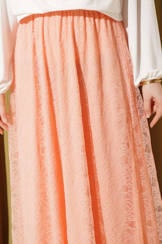 Gonna elastica con pizzo floreale color salmone