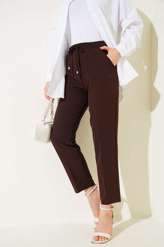 Buy Elastic Narrow-Leg Pants in Dark Brown