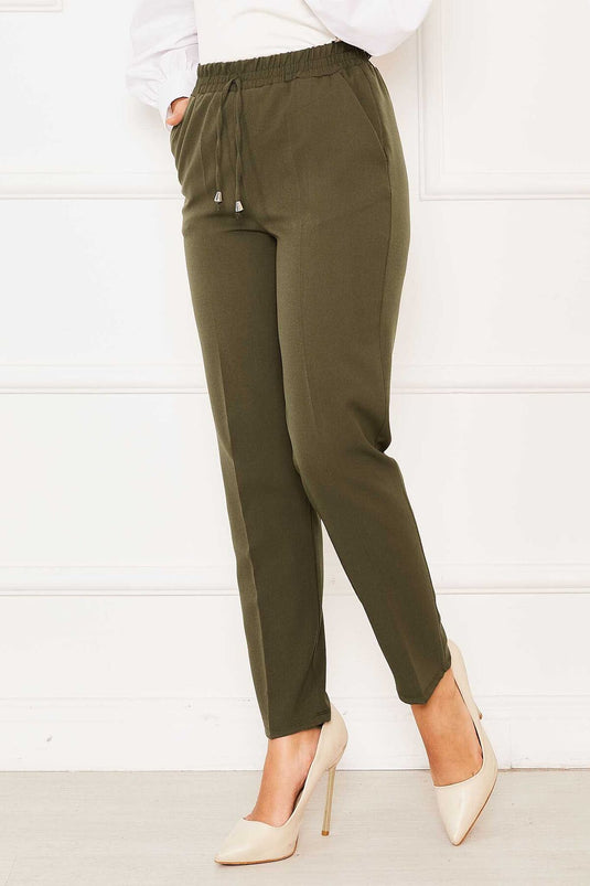 Pantaloni skinny con elastico in vita cachi