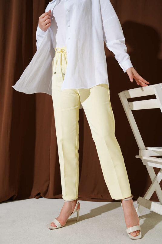 Beli Lastikli Dar Paça Pantolon Sarı