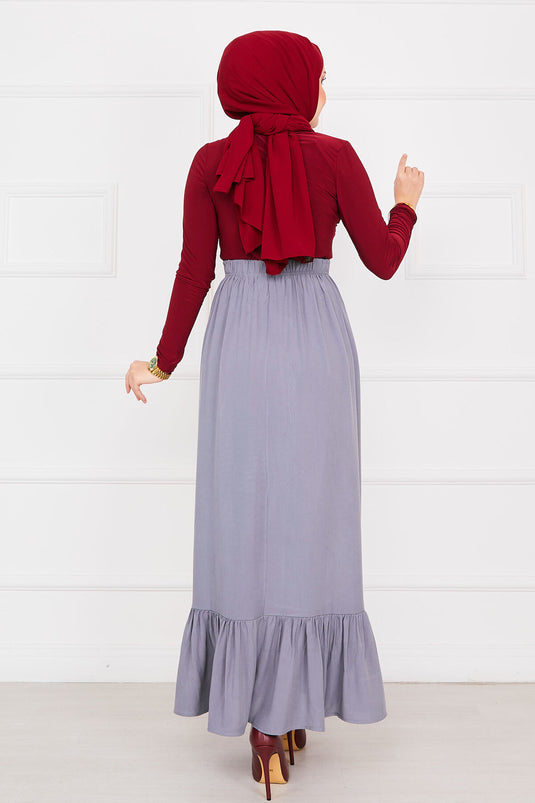 تنورة حجاب رمادية اللون مع أزرار وخصر مطاطي