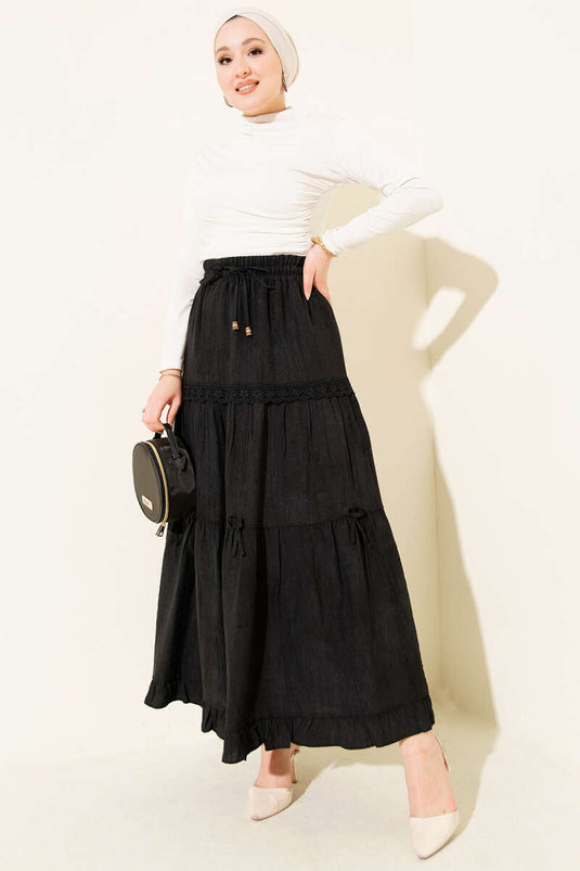 Gonna nera con elastico e fiocco