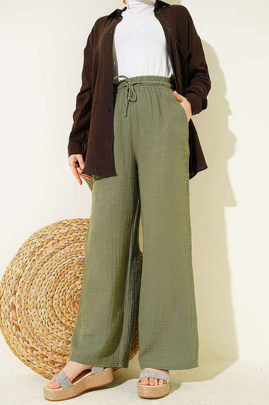 Pantaloni ampi in mussola con elastico, colore kaki