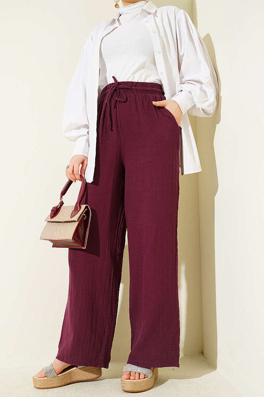 Pantaloni ampi in mussola con elastico, colore prugna