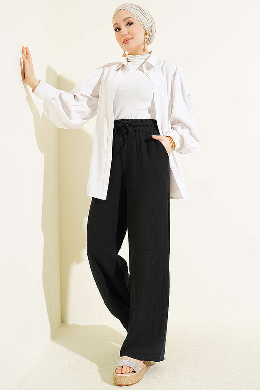 Pantalon large en mousseline à taille élastique noir