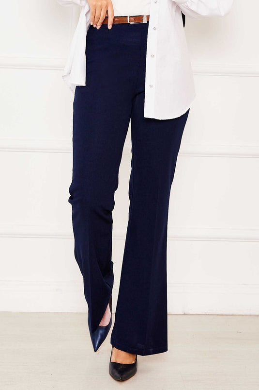 بنطلون جينز بخصر مطاطي وقصة جرس باللون الأزرق الداكن