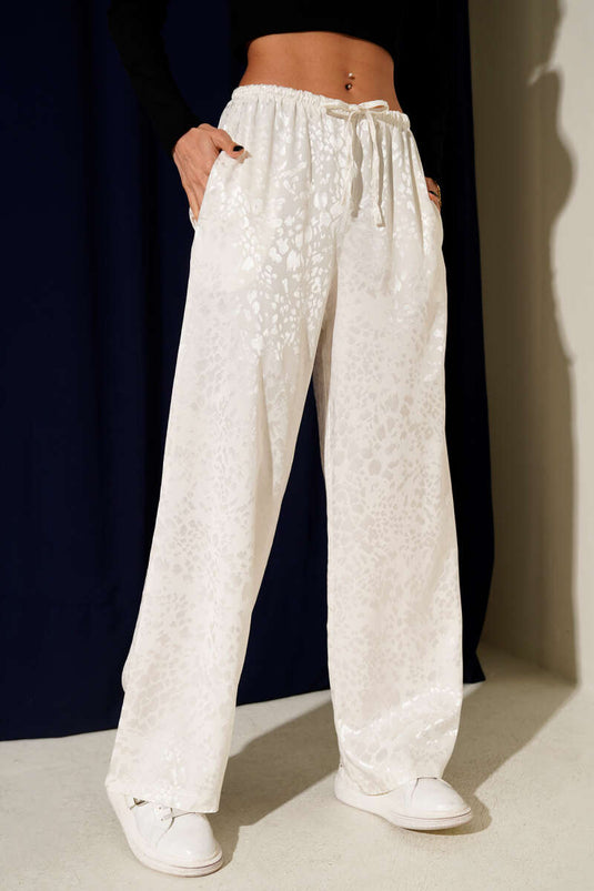 بنطلون واسع الساقين من قماش الجاكار مع حزام خصر مطاطي، لون بيج فاتح