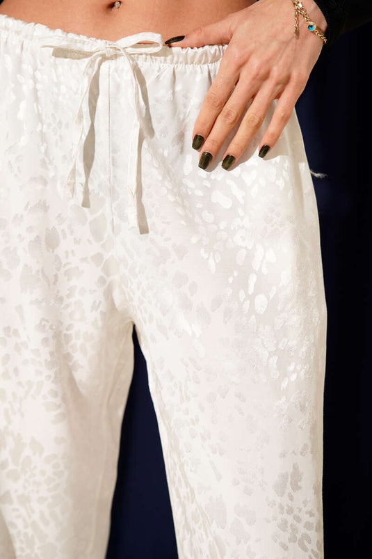 بنطلون واسع الساقين من قماش الجاكار مع حزام خصر مطاطي، لون بيج فاتح