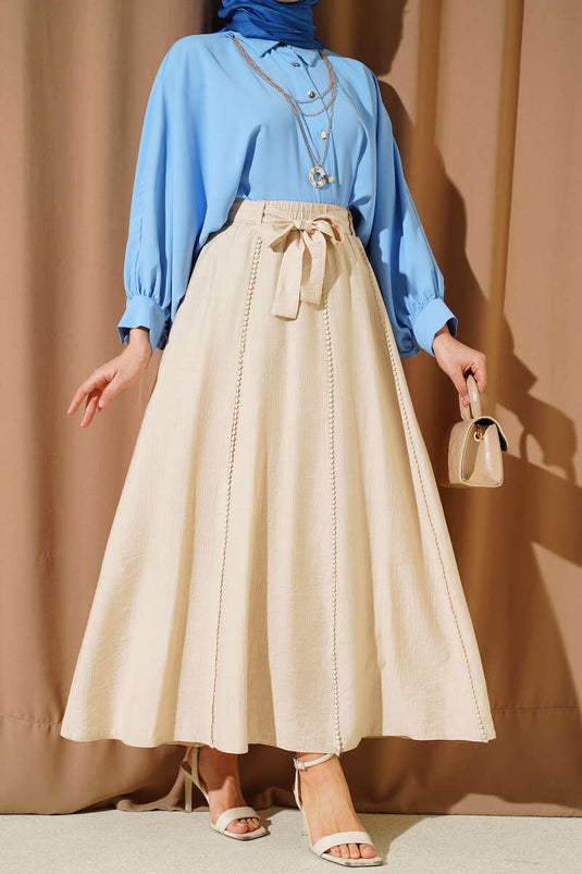 Jupe évasée beige avec ceinture élastique