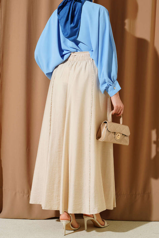 Jupe évasée beige avec ceinture élastique