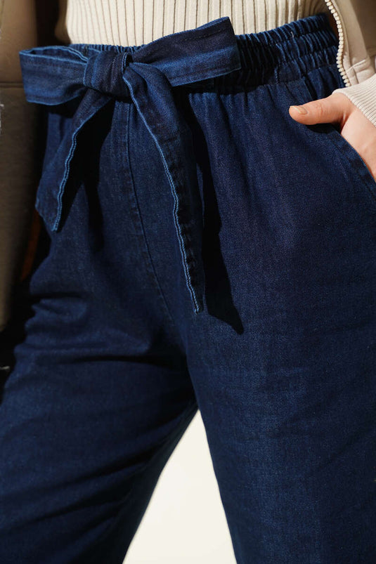 Pantaloni di jeans blu scuro con cintura elastica