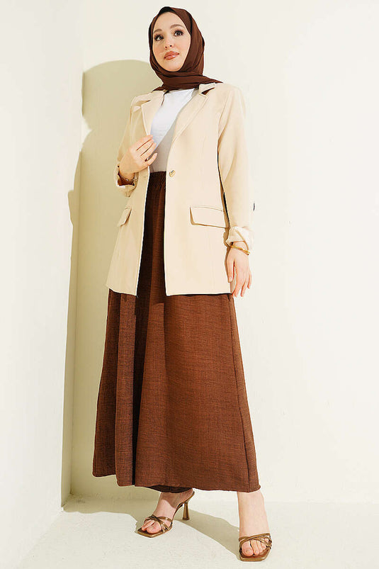 Pantaloni oversize con elastico e fondo ampio color caffè