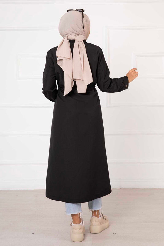 معطف واقٍ من المطر مزود بحزام خصر على شكل نفق وتفاصيل جيوب، أسود